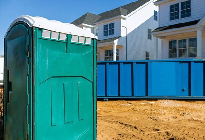 essential amenities at a bustling work site portable toilets